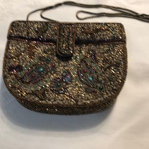 handbag from Philippines. It has paillettesBronze